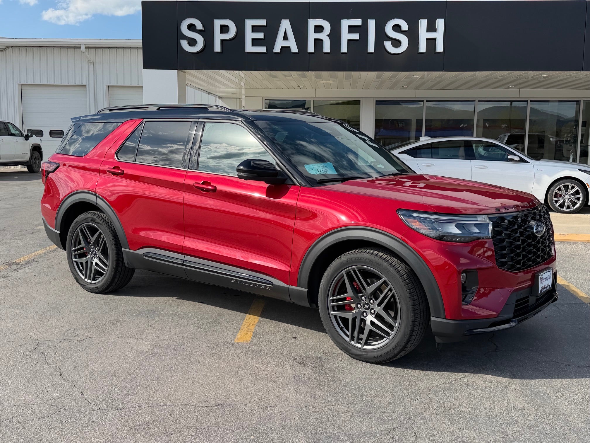 2025 Ford Explorer ST 4WD in Red — front three-quarter view