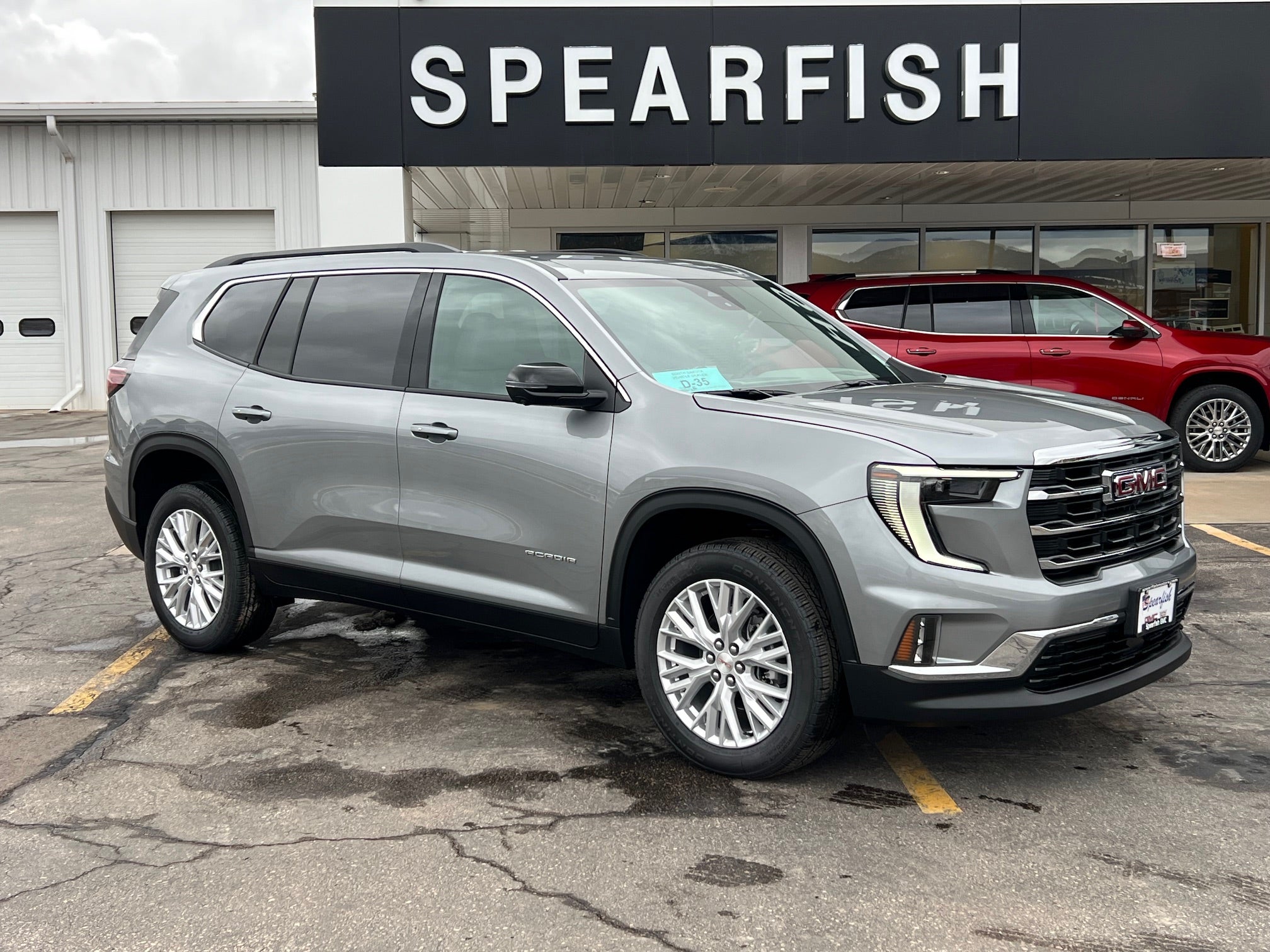 2026 GMC Acadia Elevation in Sterling Metallic — front three-quarter view