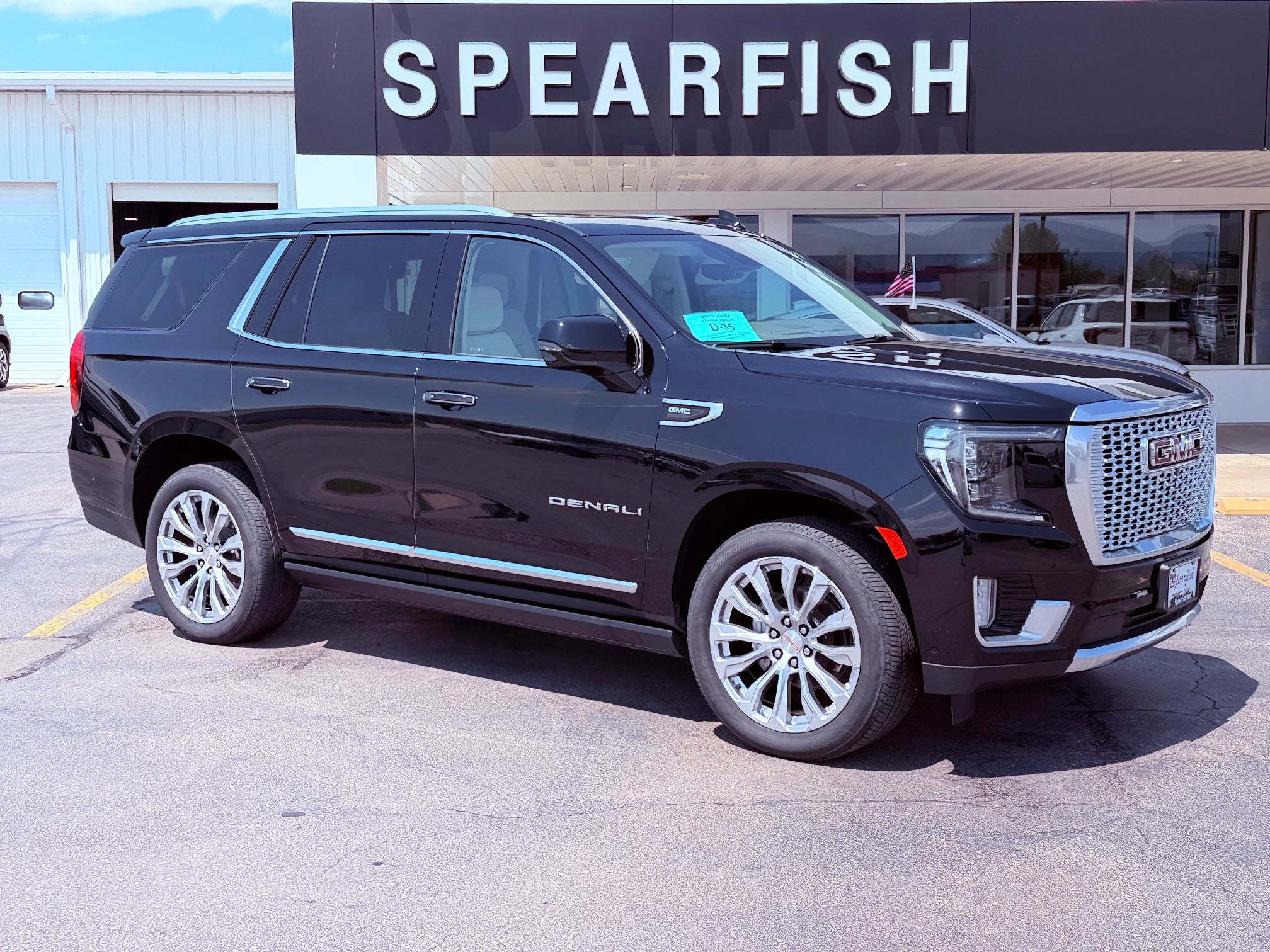 2024 GMC Yukon Denali in Onyx Black — front three-quarter view