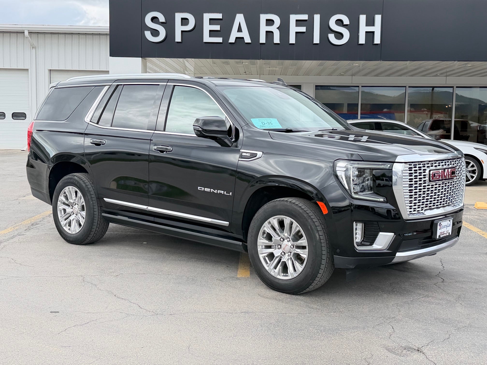 2023 GMC Yukon Denali in Onyx Black — front three-quarter view