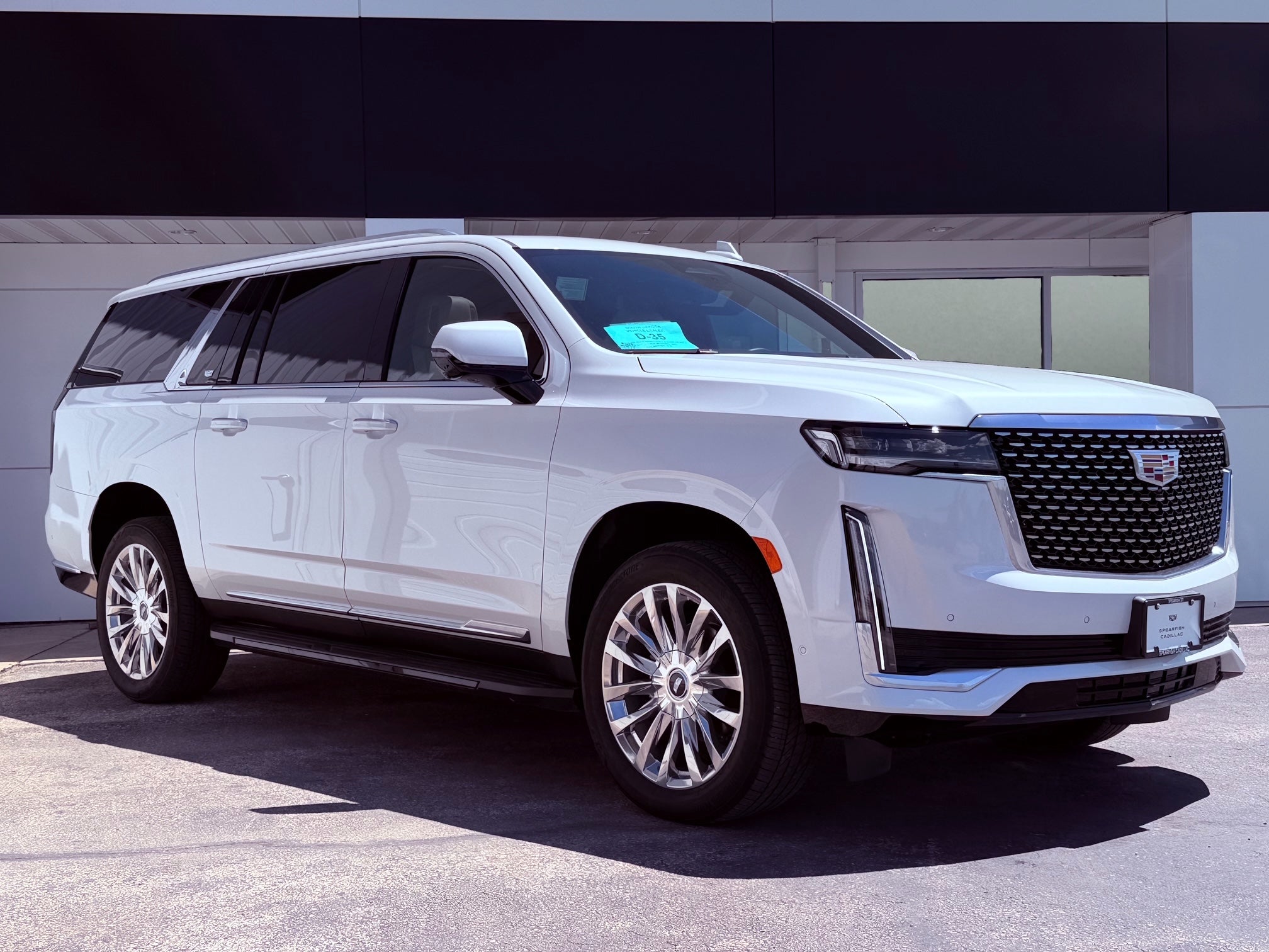 2021 Cadillac Escalade ESV Premium Luxury in Crystal White Tricoat — front three-quarter view