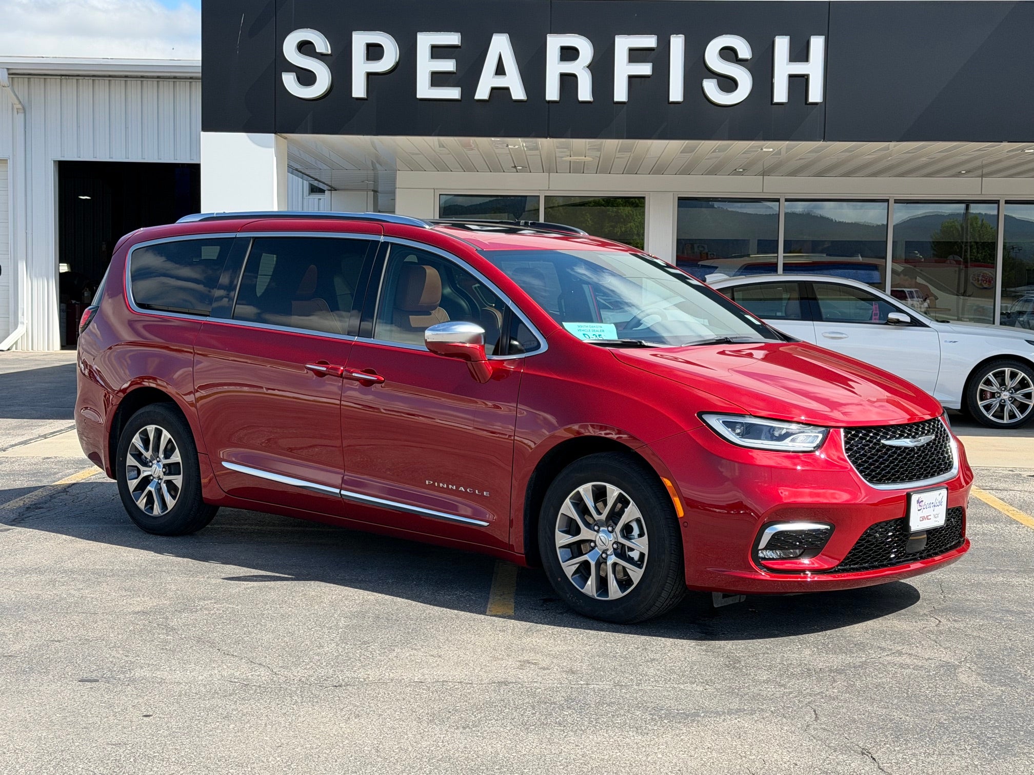 2024 Chrysler Pacifica Hybrid Hybrid Pinnacle FWD in Red — front three-quarter view
