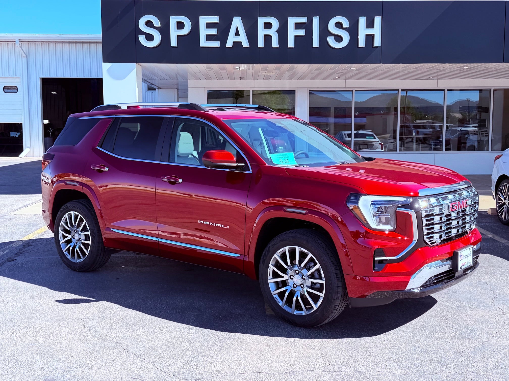 2027 GMC Terrain AWD Denali in Volcanic Red Tintcoat — front three-quarter view