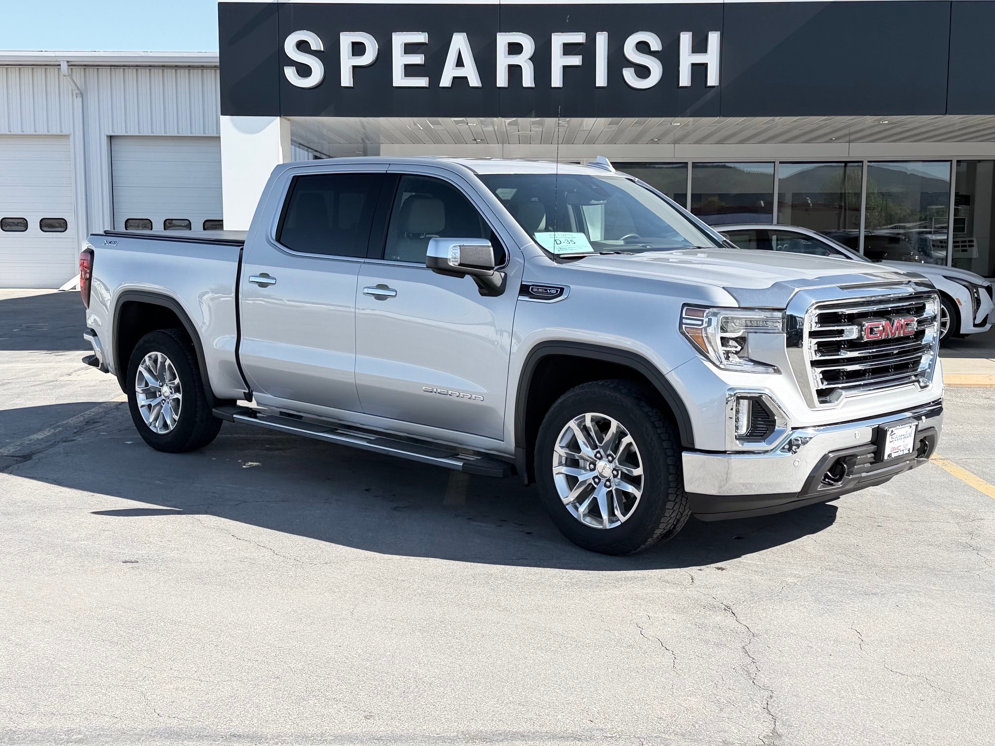 2020 GMC Sierra 1500 SLT in Quicksilver Metallic — front three-quarter view