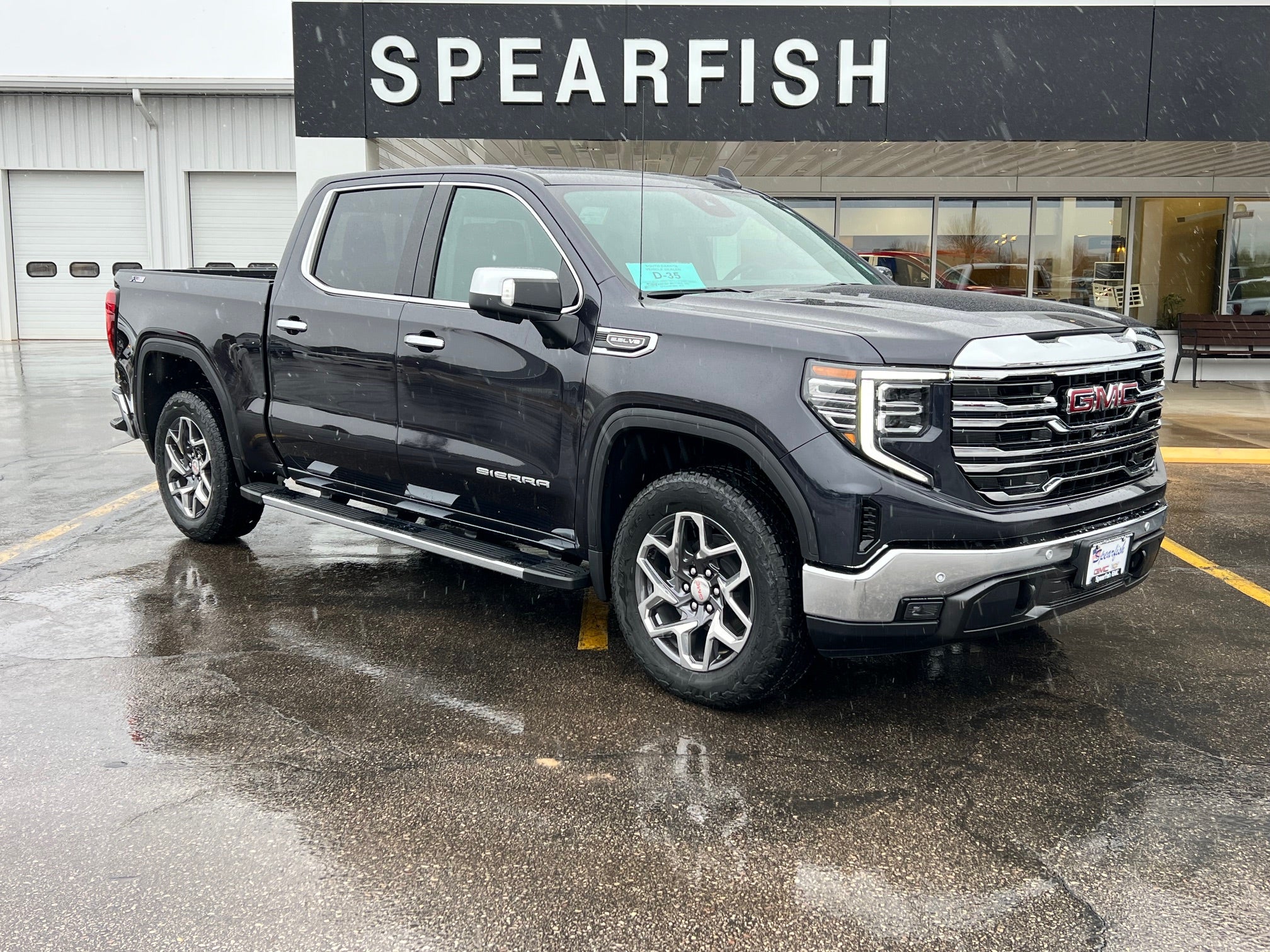 2026 GMC Sierra 1500 SLT in Titanium Rush Metallic — front three-quarter view